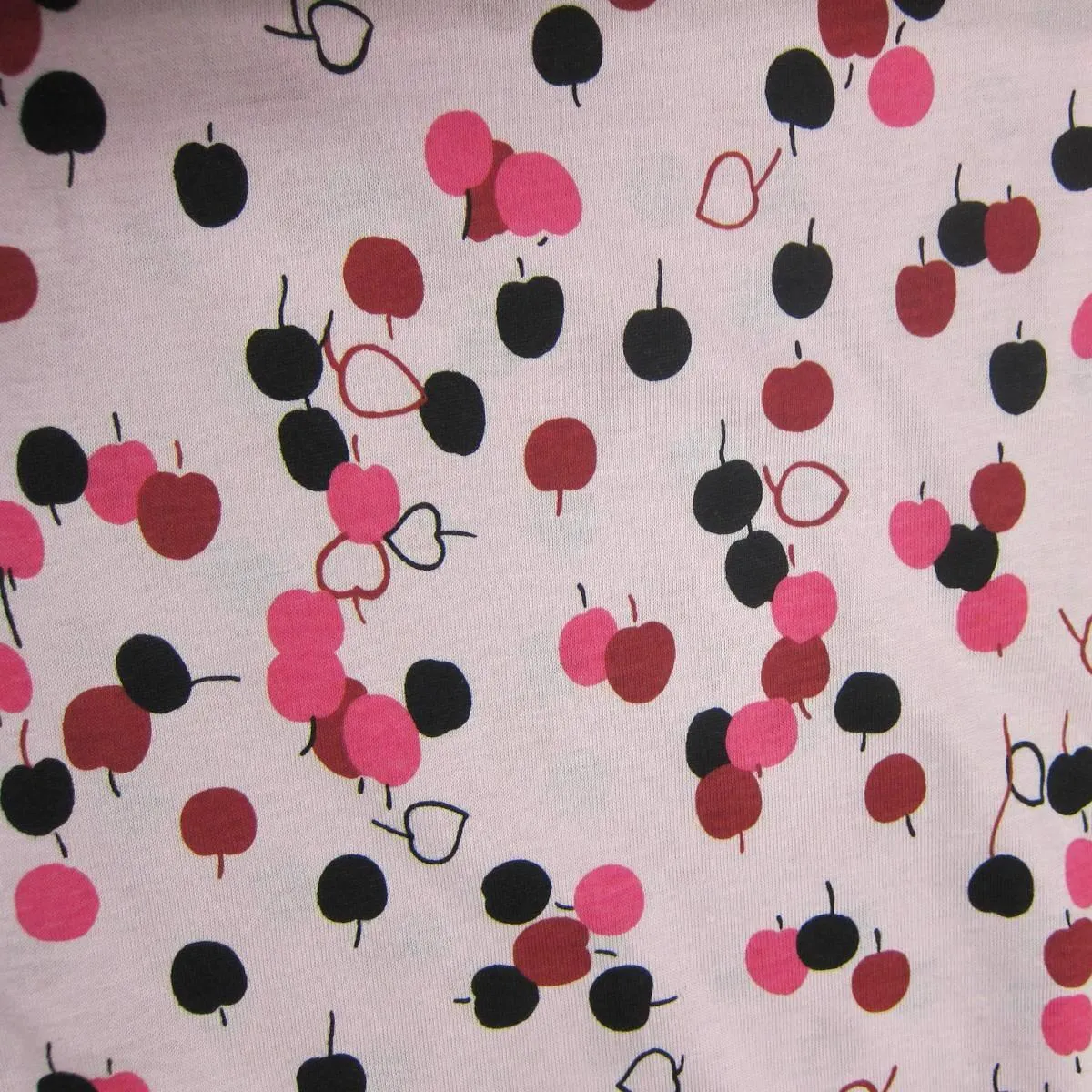 Cherry Toss on Pink Cotton Jersey Fabric