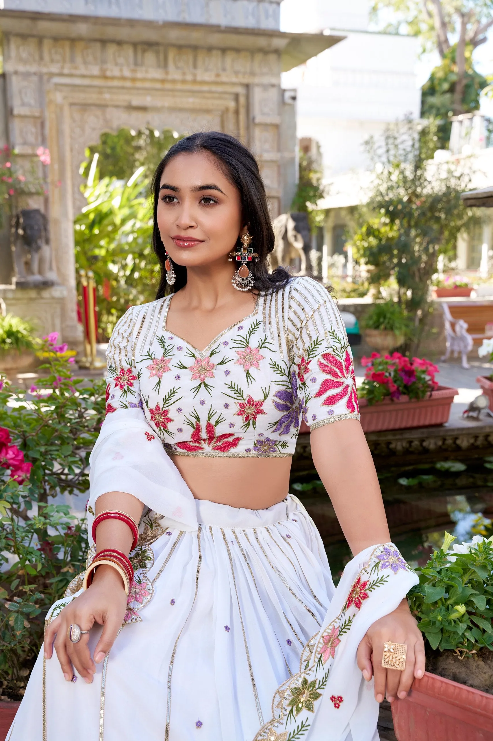 Fiery and Classic White Georgette Embroidered Lehenga Choli