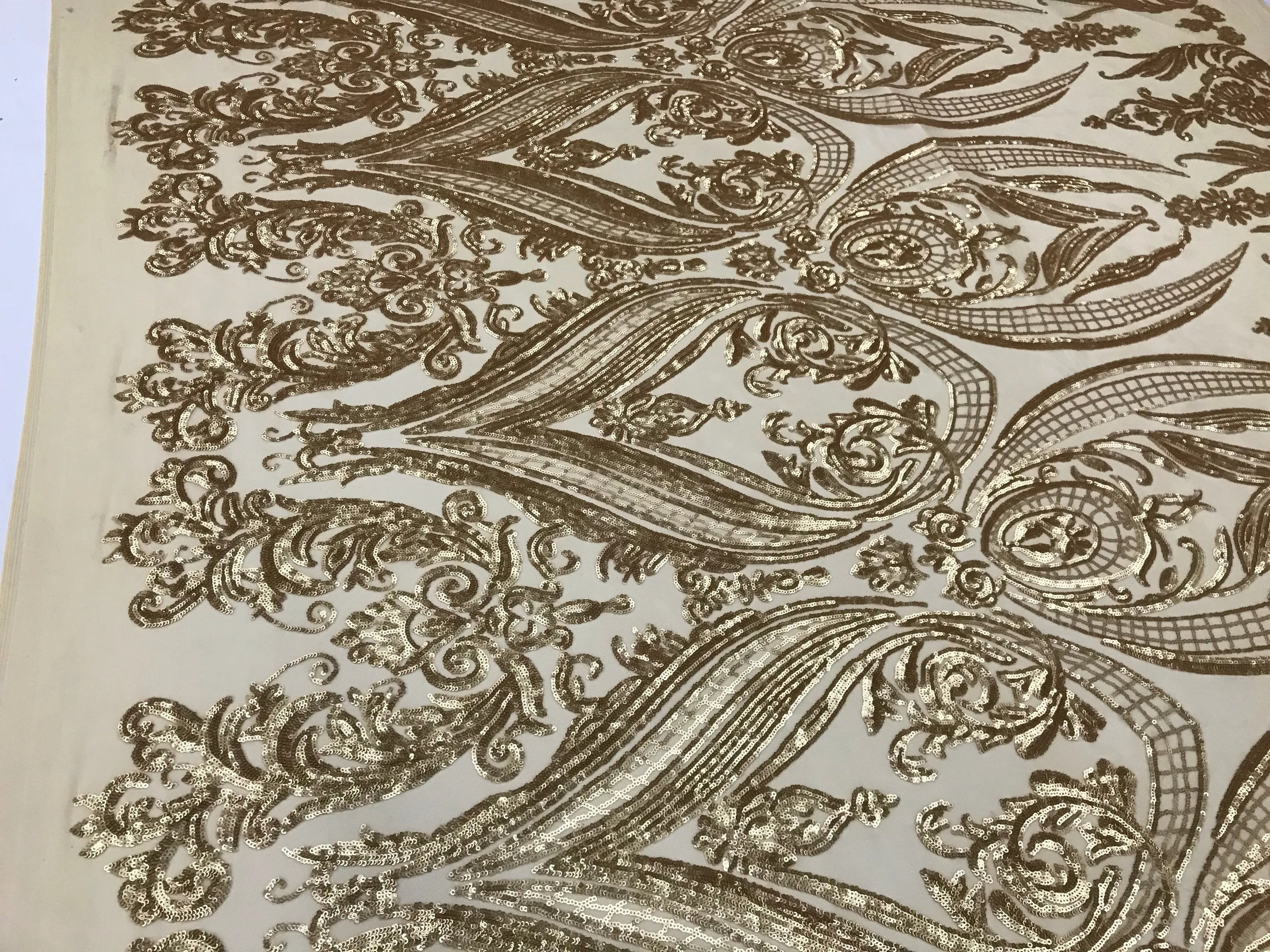 Matt gold princess design embroidery with sequins on a 4 way Stretch Mesh-dresses-sold by the yard