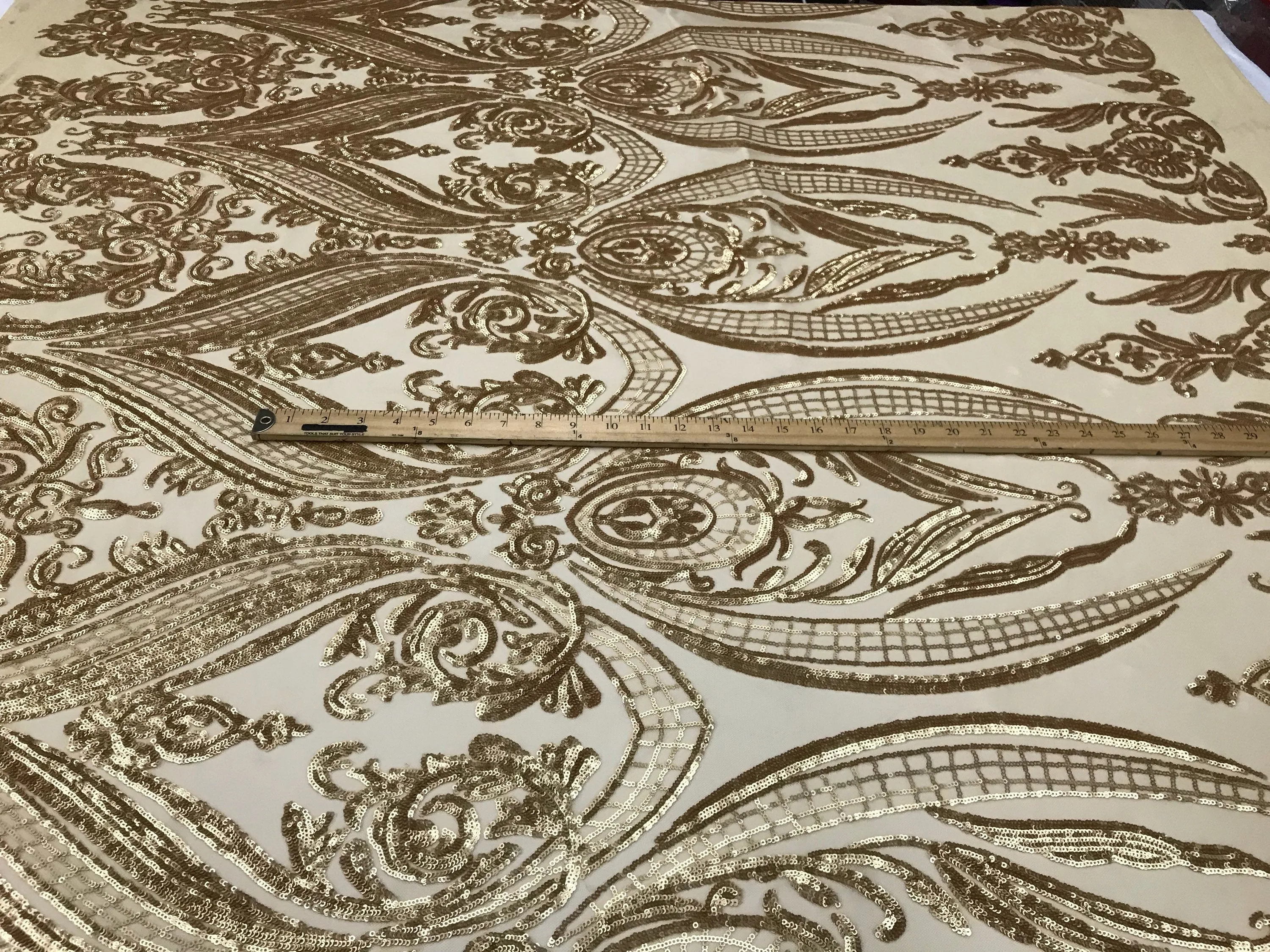 Matt gold princess design embroidery with sequins on a 4 way Stretch Mesh-dresses-sold by the yard