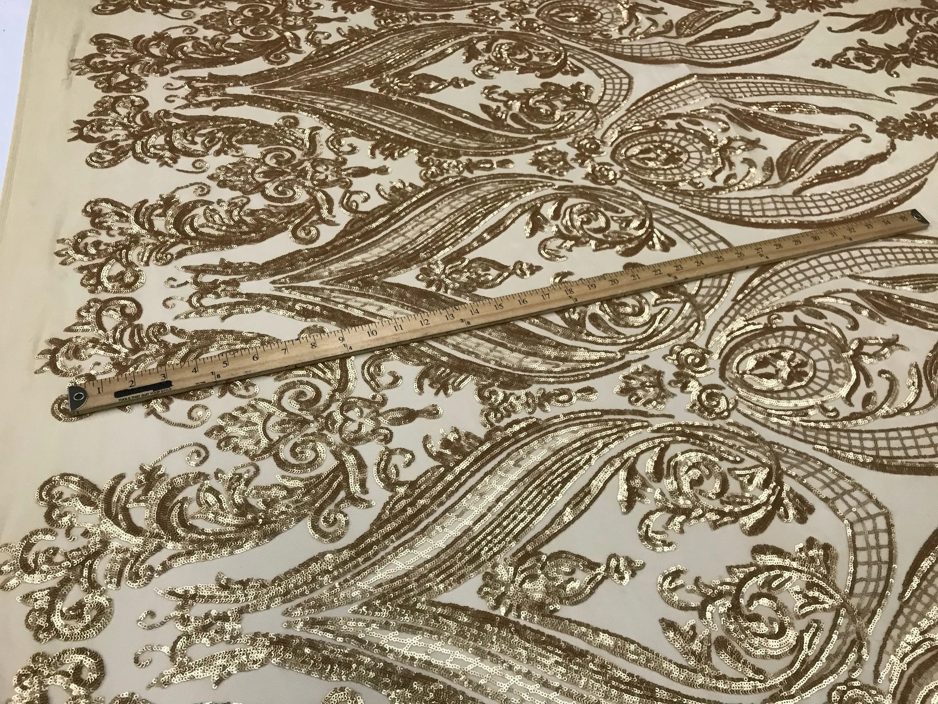 Matt gold princess design embroidery with sequins on a 4 way Stretch Mesh-dresses-sold by the yard