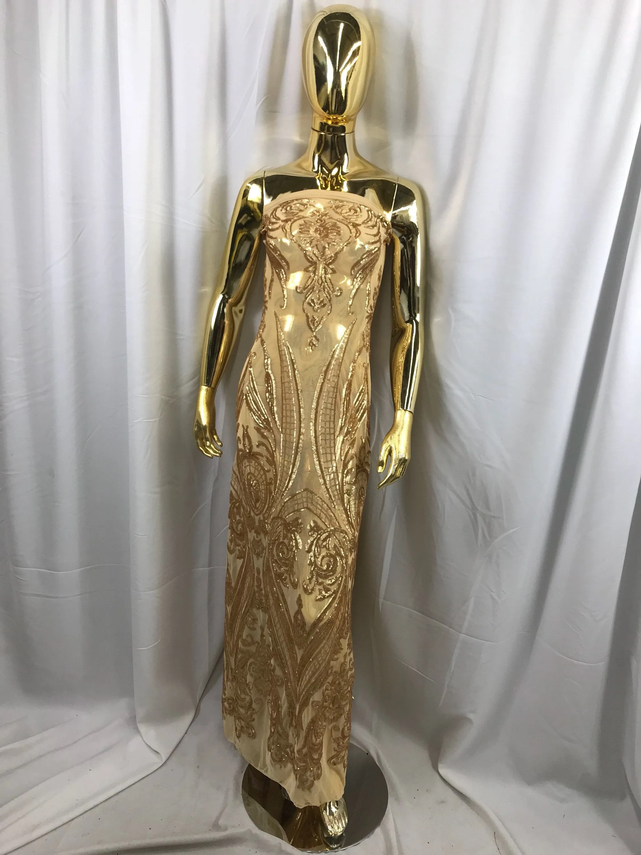 Matt gold princess design embroidery with sequins on a 4 way Stretch Mesh-dresses-sold by the yard